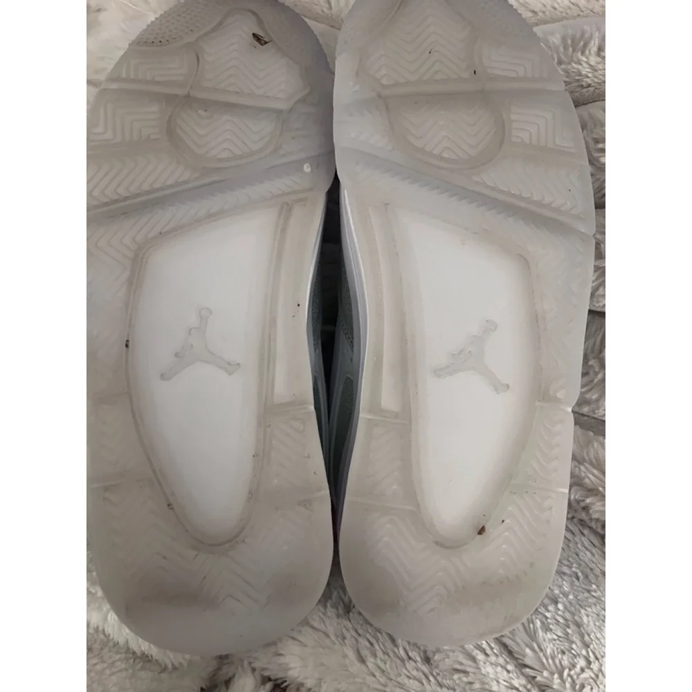 Air Jordan 4 RM 'White Silver Glitter' sneakers with the style code HQ34 size 7